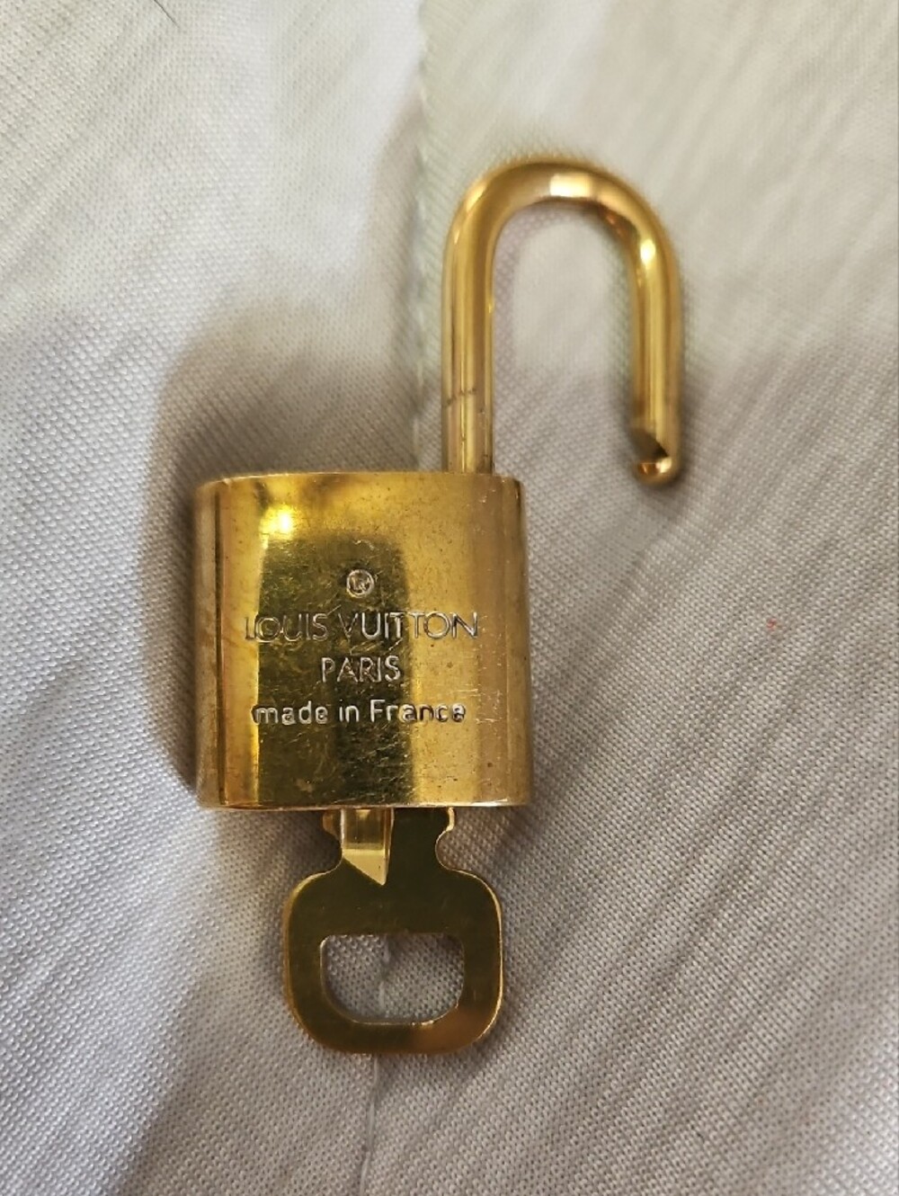 Louis Vuitton Gold Tone Lock And Key with LV Monogram - Picture 2 of 5
